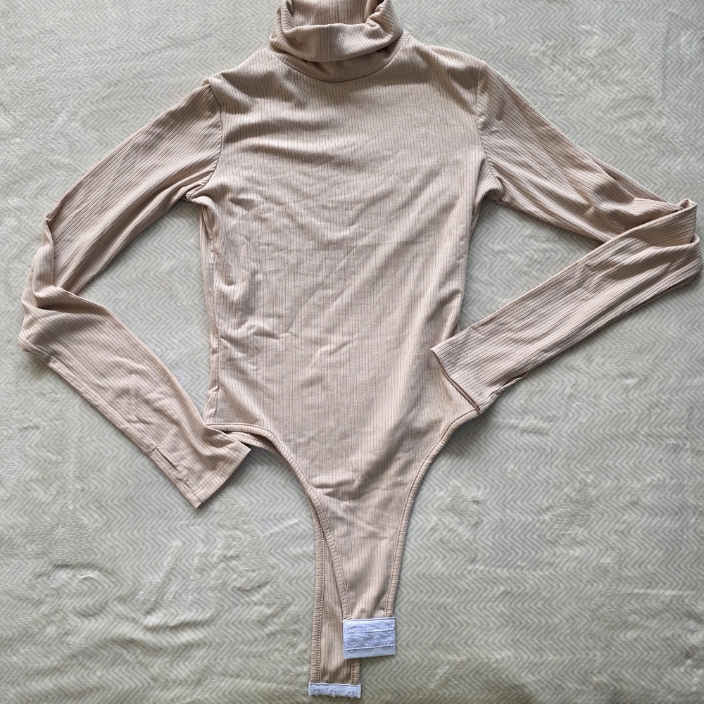 Shop Boyed Ribbed Turtleneck Bodysuit with Thumbholes - Oatmeal